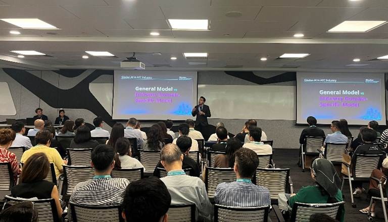 Dr. Nazirul Fariq addressing the audience on the importance of domain-specific AI for construction, part of Glodon&rsquo;s Three-High strategy.